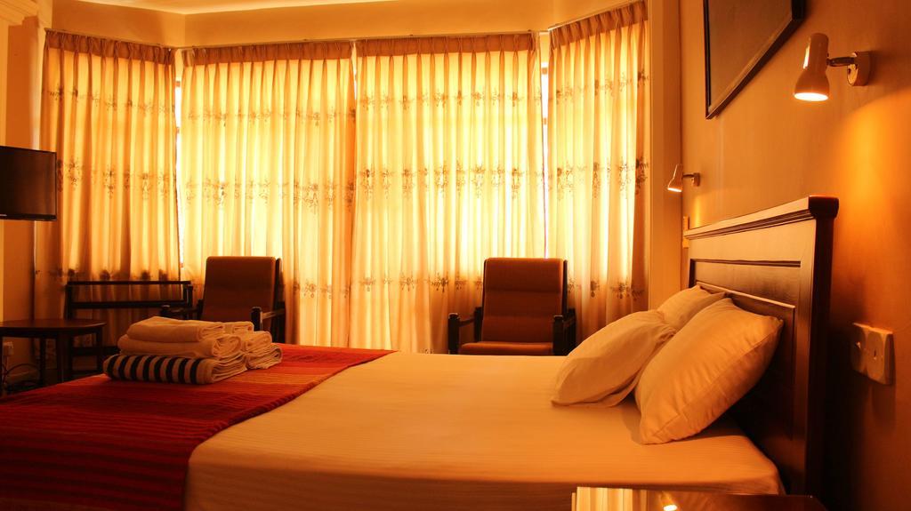 Hotel Janishi Residencies Negombo Camera foto